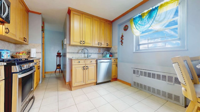 kitchen featuring light tile patterned floors, stainless steel appliances, tasteful backsplash, radiator, and light stone countertops