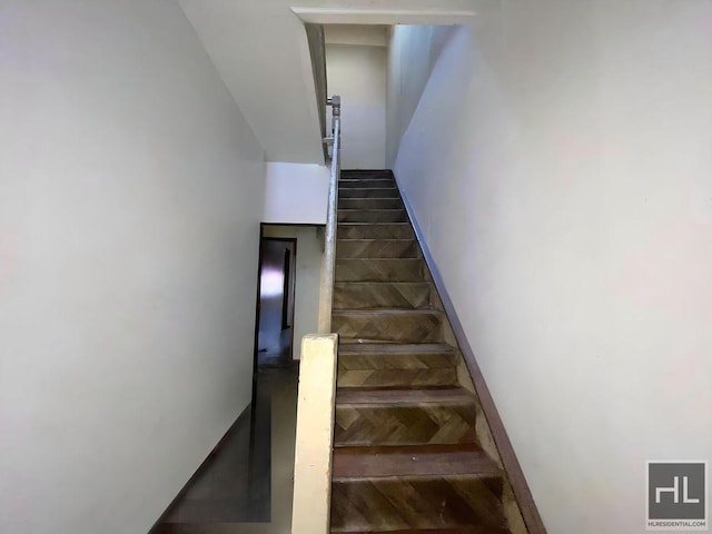 staircase with baseboards