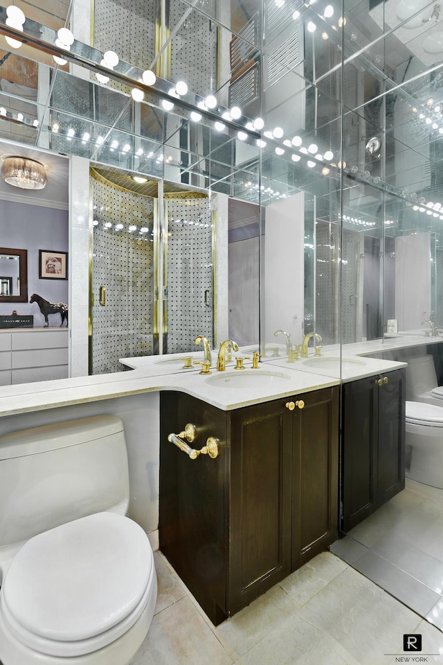 full bath featuring tile patterned flooring, a stall shower, toilet, and vanity