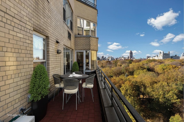 balcony featuring a view of city