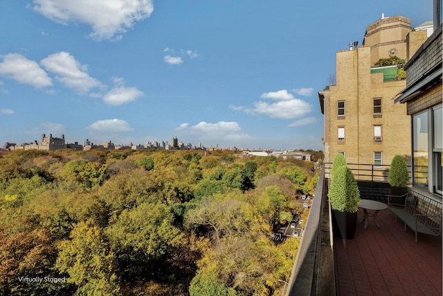 balcony featuring a view of city