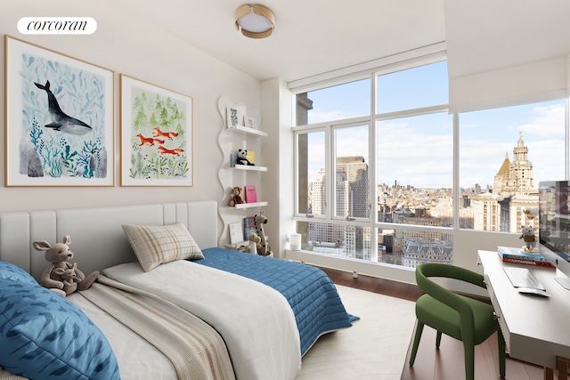 bedroom featuring wood finished floors and visible vents