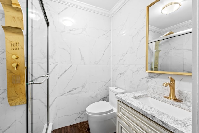 full bathroom with a marble finish shower, vanity, toilet, and crown molding