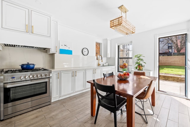 dining space with light wood-style floors