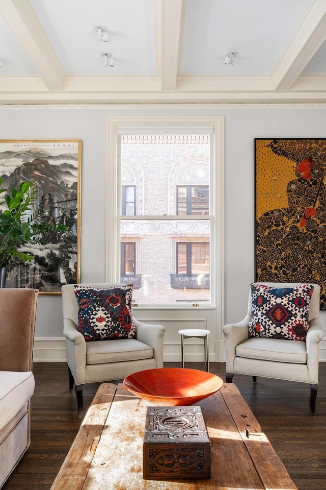 563 Park Ave Unit 11E, New York City, NY 10065 - sitting room with wood finished floors, beamed ceiling, and baseboards