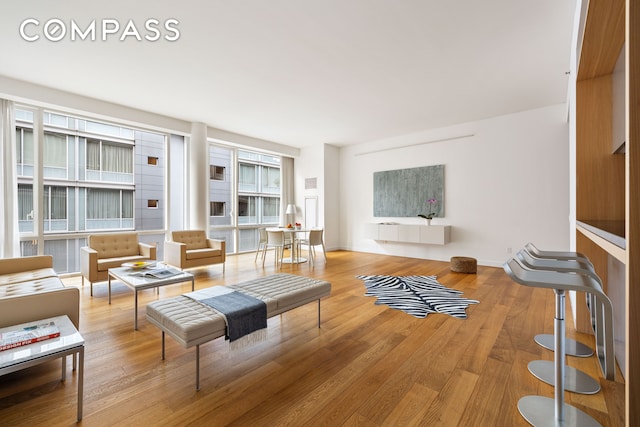 311 W Broadway Unit 5I, New York City, NY 10013 - living area featuring wood finished floors