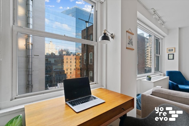 office area featuring rail lighting