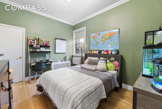 288 W 92nd St Unit 5Ade, New York City, NY 10025 - bedroom featuring ornamental molding, light wood-type flooring, baseboards, and an office area