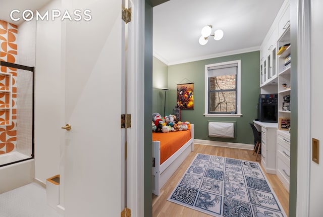 288 W 92nd St Unit 5Ade, New York City, NY 10025 - bathroom with wood finished floors, crown molding, vanity, and baseboards