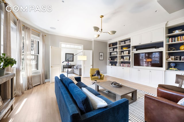 288 W 92nd St Unit 5Ade, New York City, NY 10025 - living area featuring light wood-style floors, crown molding, a chandelier, and built in shelves