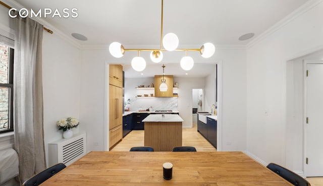 288 W 92nd St Unit 5Ade, New York City, NY 10025 - dining room with light wood finished floors and crown molding