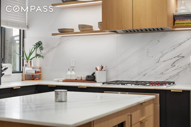 288 W 92nd St Unit 5Ade, New York City, NY 10025 - kitchen with stainless steel gas cooktop and dark cabinets
