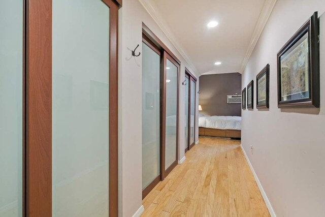 215 E 24th St Unit 226-227, New York City, NY 10010 - sitting room with baseboards, recessed lighting, wood finished floors, and crown molding