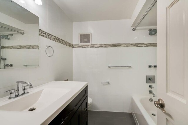 215 E 24th St Unit 226-227, New York City, NY 10010 - bedroom with ornamental molding, multiple windows, and light wood-style flooring