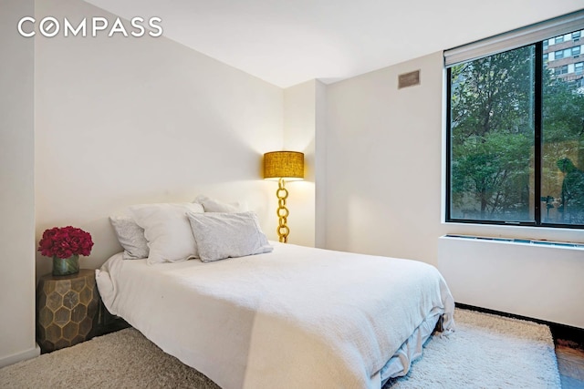 309 E 49th St Unit 2B3B, New York City, NY 10017 - bedroom with baseboards