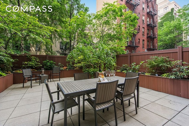 309 E 49th St Unit 2B3B, New York City, NY 10017 - fenced backyard featuring a patio area