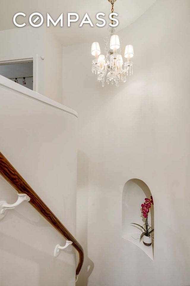 309 E 49th St Unit 2B3B, New York City, NY 10017 - stairs with a chandelier