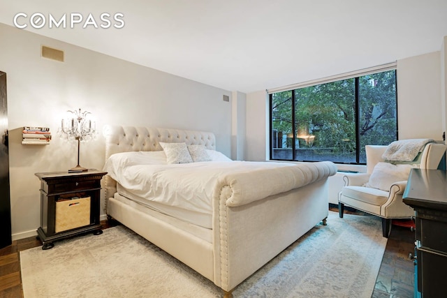 309 E 49th St Unit 2B3B, New York City, NY 10017 - bedroom with wood finished floors