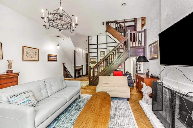 living room with stairway and an inviting chandelier