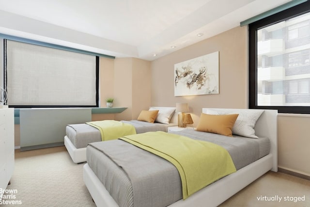 carpeted bedroom featuring recessed lighting and baseboards
