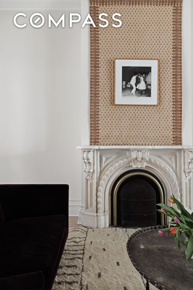 sitting room with a fireplace