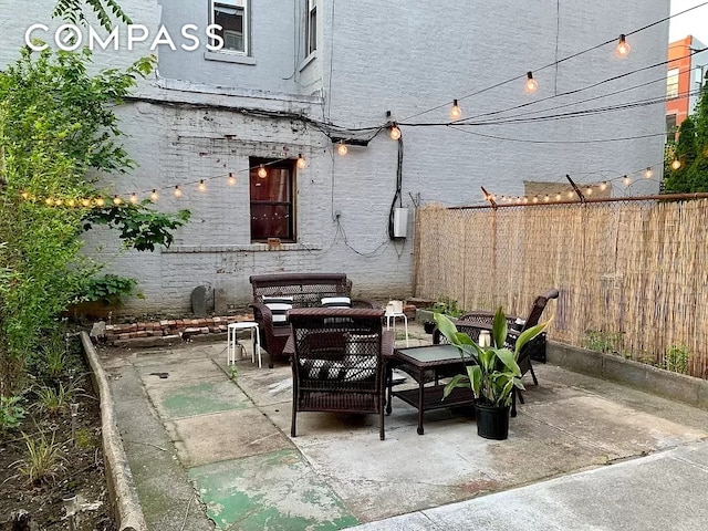 view of patio with fence