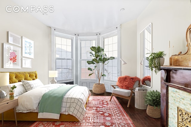 bedroom with wood finished floors