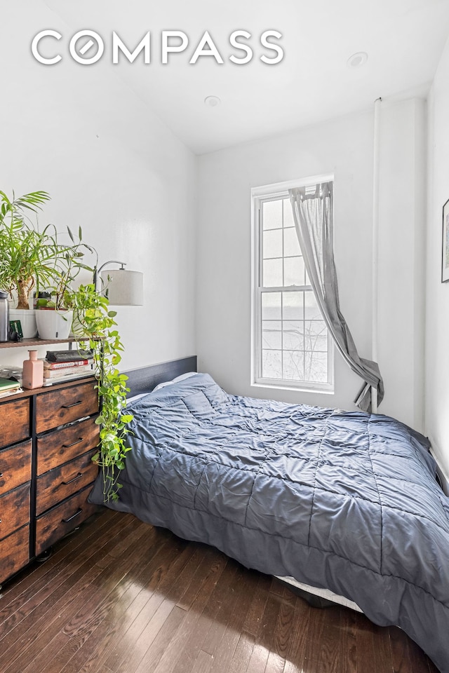 bedroom featuring hardwood / wood-style floors