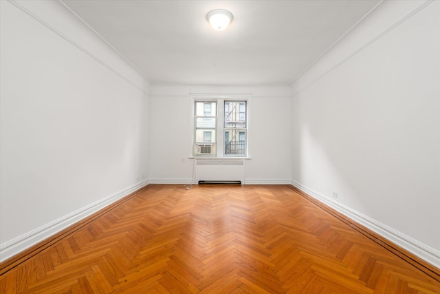 680 W 204th St Unit 3-F, New York City, NY 10034 - empty room featuring radiator and baseboards