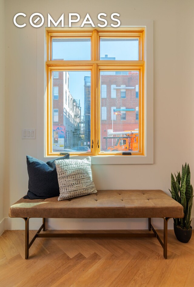 sitting room featuring plenty of natural light and a view of city