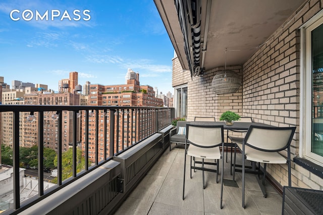 301 E 78th St Unit 16Ef, New York City, NY 10075 - balcony with a city view and outdoor dining area