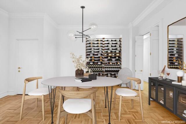 wine area with a chandelier and crown molding