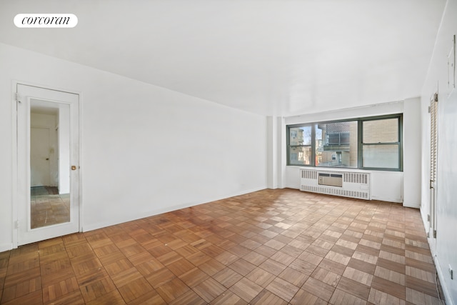525 E 86th St Unit 3E, New York City, NY 10028 - spare room with radiator and baseboards
