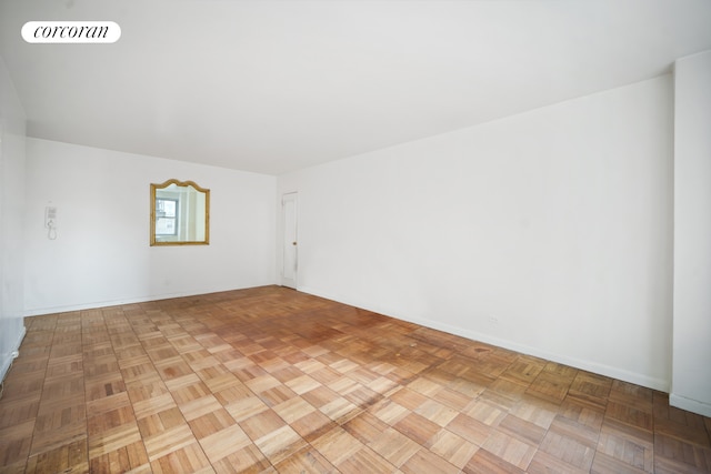 empty room with visible vents and baseboards