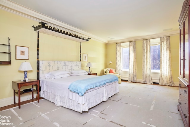 bedroom with baseboards, carpet flooring, and crown molding