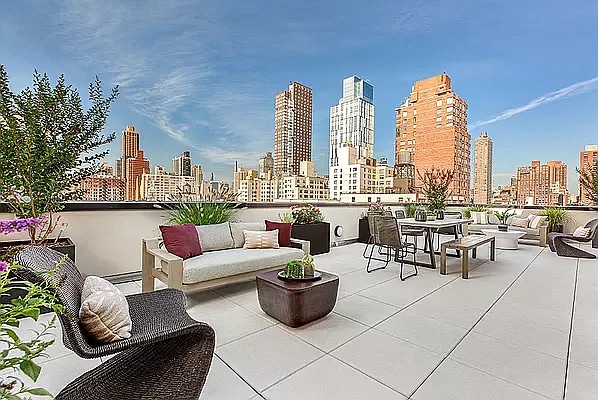 view of patio / terrace with a view of city and an outdoor hangout area