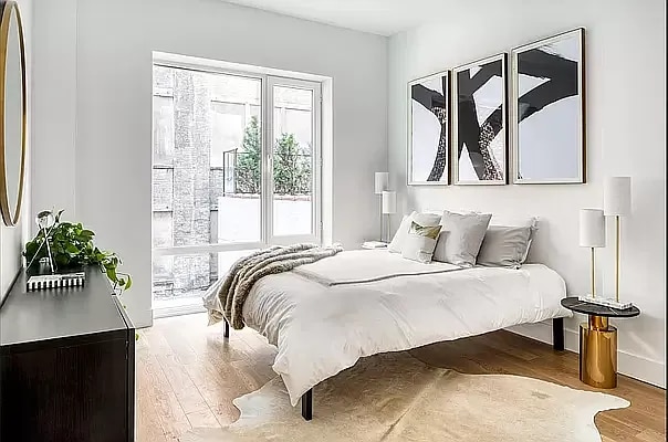 bedroom featuring wood finished floors