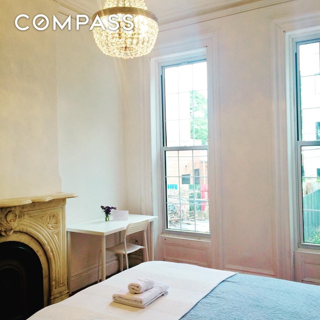 bedroom with a chandelier