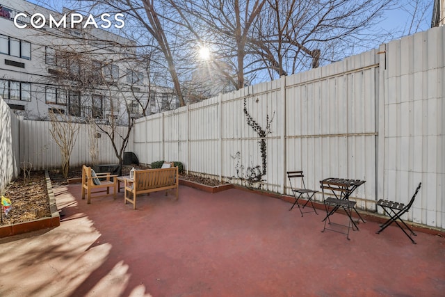 view of patio with a fenced backyard