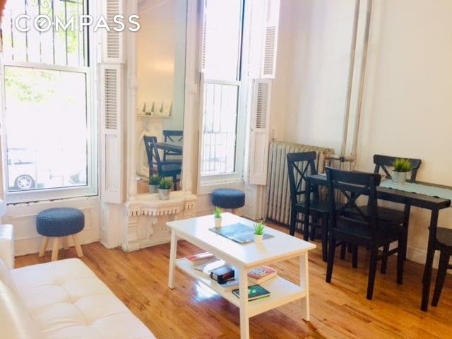 sitting room with wood finished floors