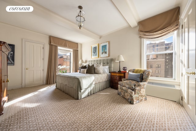 carpeted bedroom with visible vents and beamed ceiling