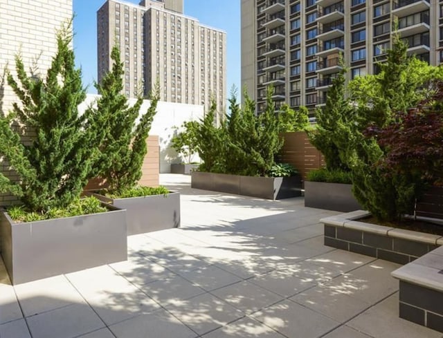 view of home's community with a patio