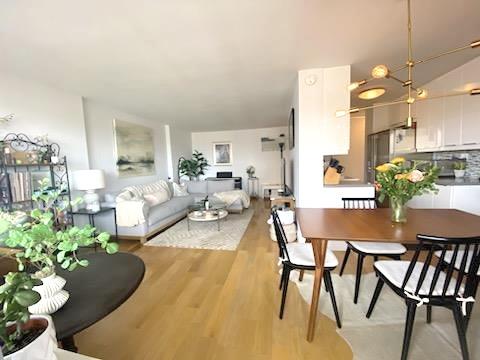 dining area with light wood-style floors