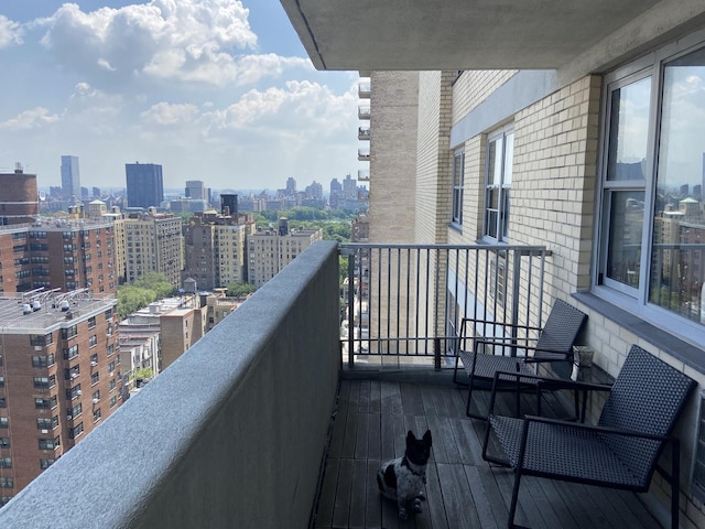 balcony featuring a view of city