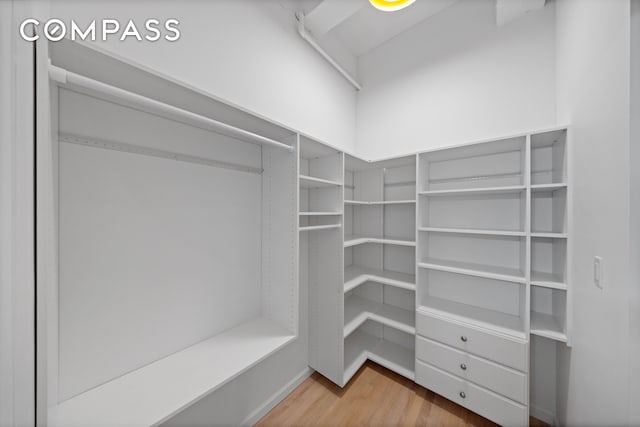 95 Vandam St Unit 2R, New York City, NY 10013 - spacious closet with light wood-style flooring
