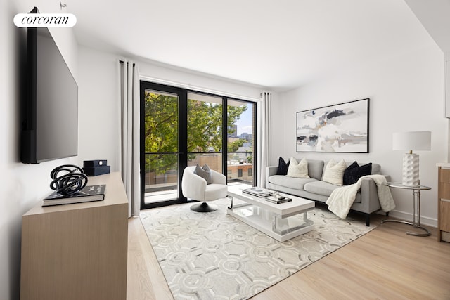 27-09 40th Ave Unit 3G, New York City, NY 11101 - living area featuring light wood-type flooring