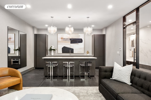27-09 40th Ave Unit 3G, New York City, NY 11101 - living area featuring a chandelier and recessed lighting