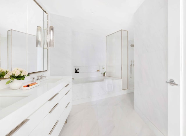 212 W 72nd St Unit 7J, New York City, NY 10023 - full bath featuring a bath, double vanity, and a walk in shower