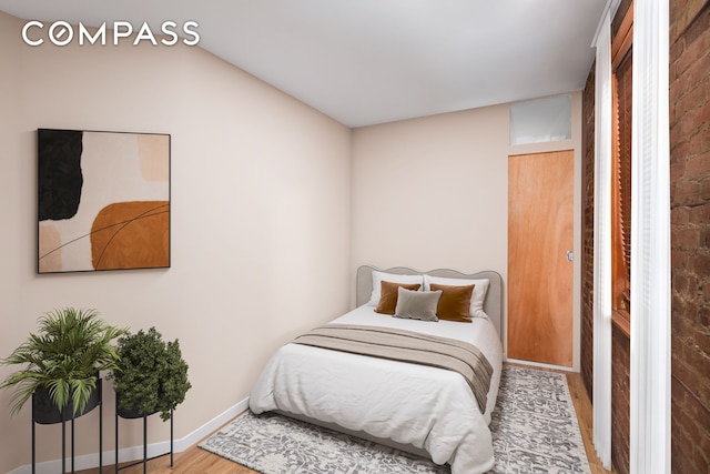 218 E 82nd St Unit 4Fw, New York City, NY 10028 - bedroom with wood finished floors and baseboards