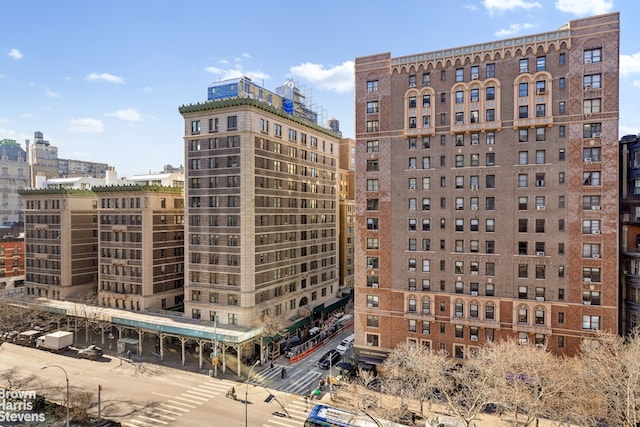 view of property with a city view